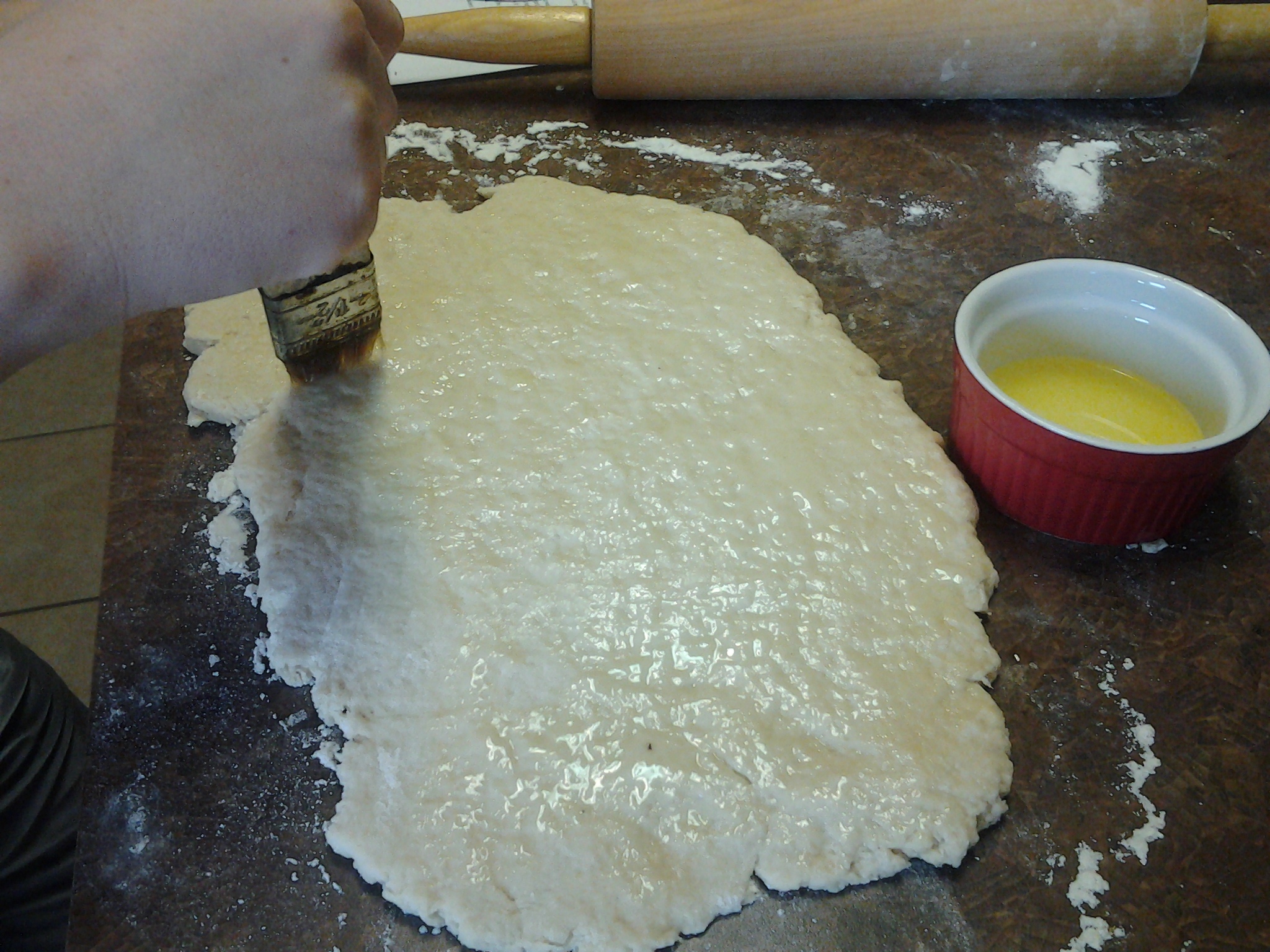 brush cinnamon rolls with butter